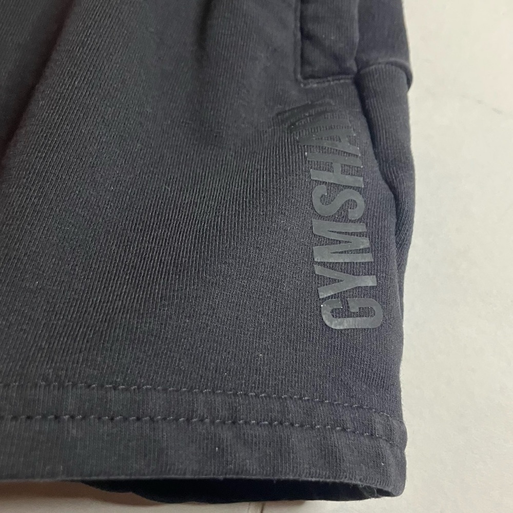 Gymshark Black sweatshirt material Athletic Shorts. Waist tie. Zipper pockets. - Picture 2 of 10